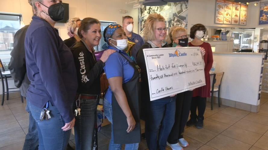 White Castle employees deliver check for more than $26,000 to Habitat for Humanity