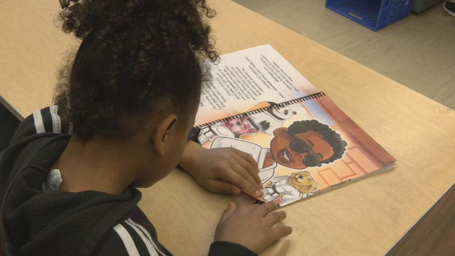 Malakai braille book read (2).jpeg