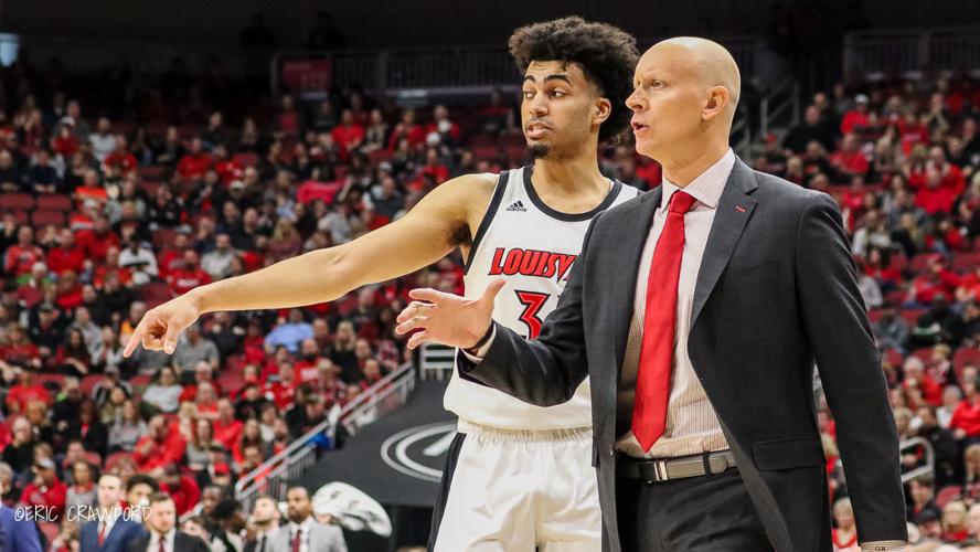 Chris Mack and Jordan Nwora