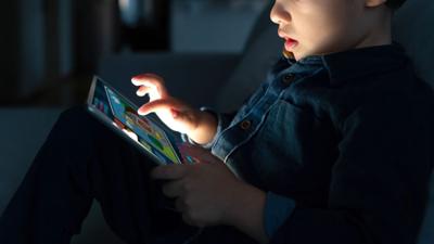 Child On Tablet