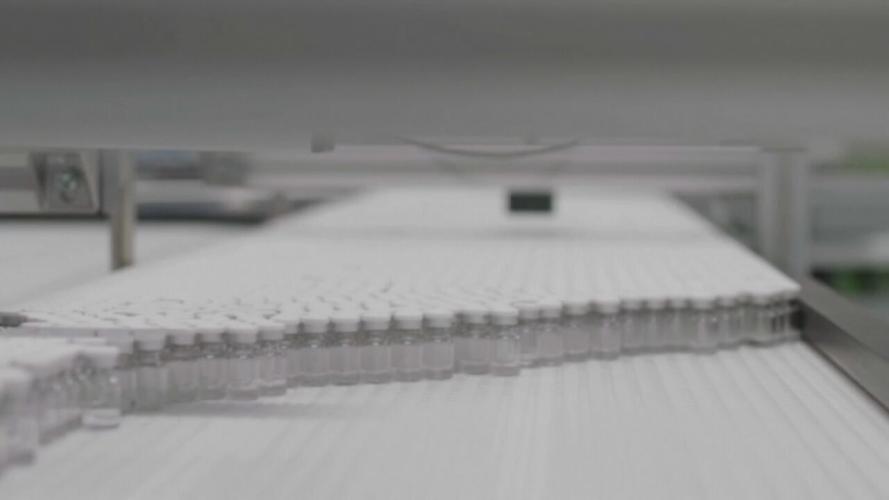 COVID-19 vaccine bottles.jpeg