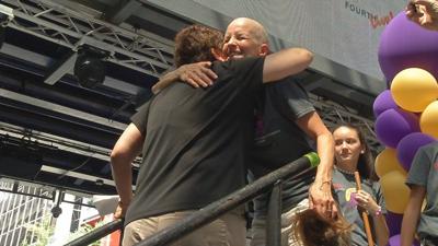 More than 100 people lined up at Fourth Street Live! to shave their heads in honor of children with cancer