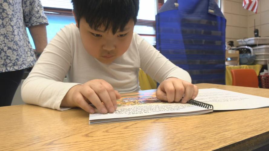 Malakai braille book read (1).jpeg