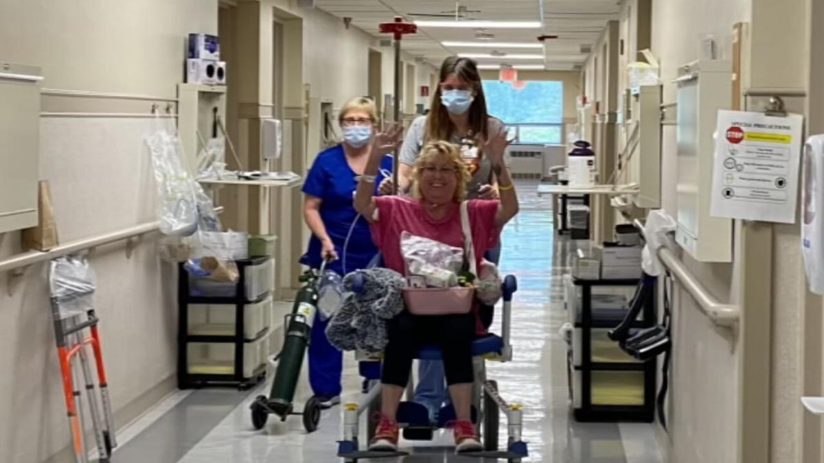 Tammy Clark-UofL Health COVID survivor-leaves hospital.jpeg