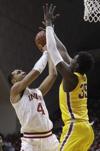 Indiana's Trayce Jackson-Davis (4) shoots against Minnesota's Isaiah Ihnen