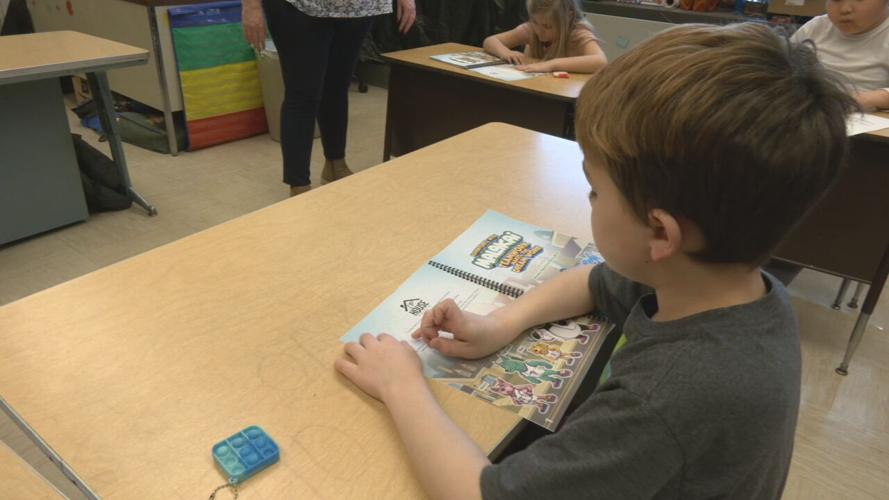 Malakai braille book read.jpeg