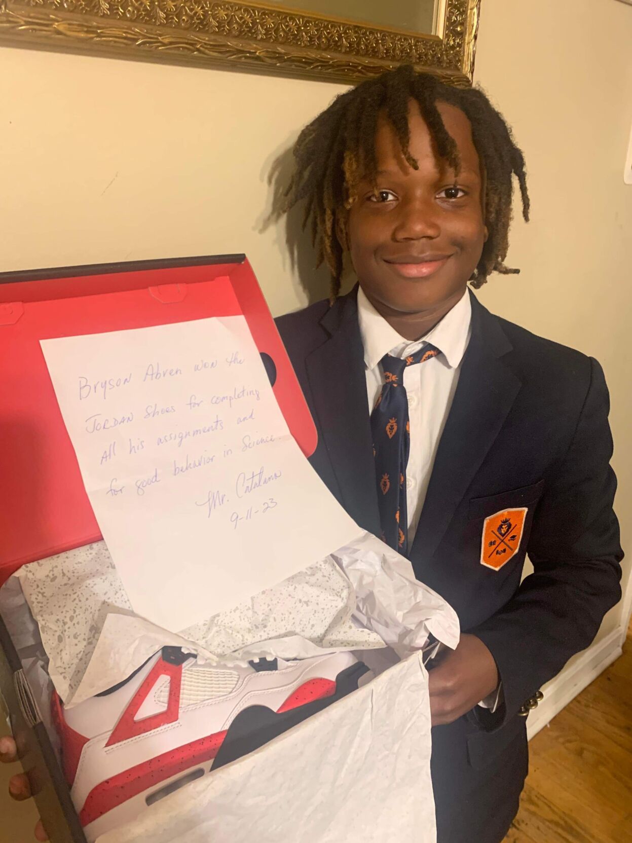 JCPS student Bryson Abren with Jordan shoes