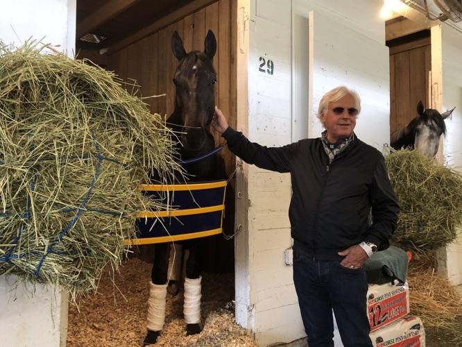 Bob Baffert pets Derby runner Medina Spirit ahead of 147th Run for the Roses