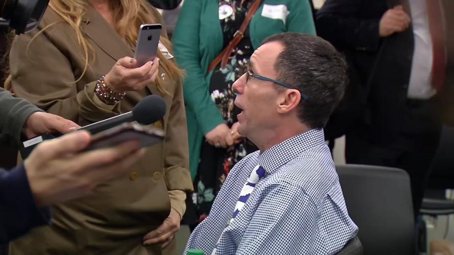 Eric Crawford, an advocate for medical marijuana, talks to reporters after Feb. 12, 2020 hearing