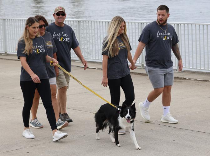 Alexis Carrico walks with family