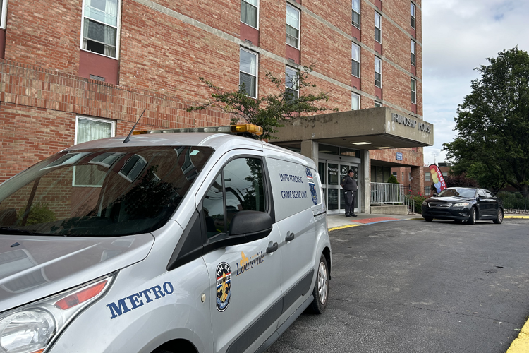 LMPD vehicle parked outside Friendship House in downtown Louisville, Ky.
