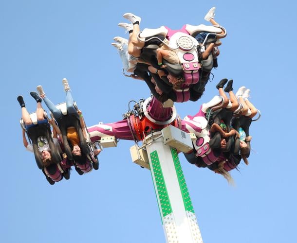 People flung around at Kentucky State Fair ride.JPG
