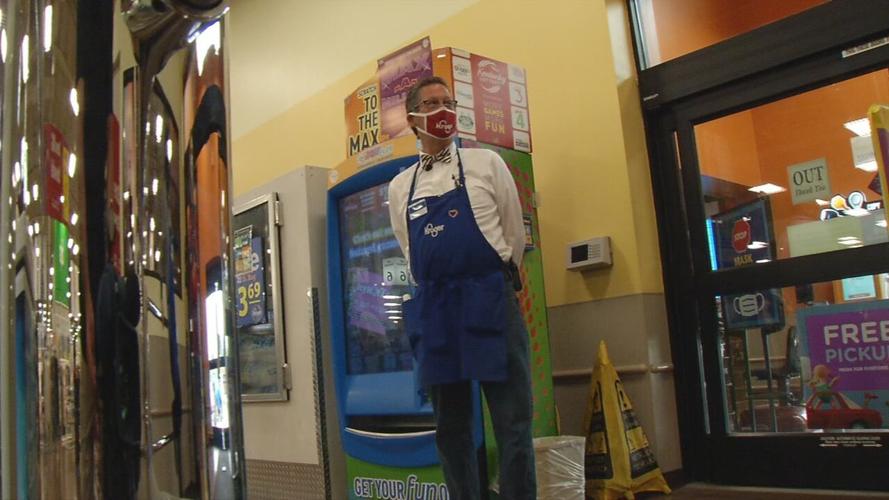 Terry Rush greets customers at Dixie Highway Kroger