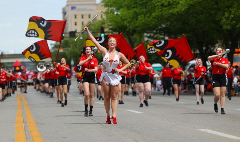 UofL Marching band walks in parade.JPG