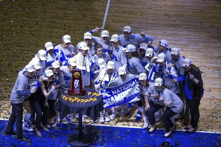Kentucky poses for a team photo after defeating Texas in the final of the NCAA women's volleyball championships