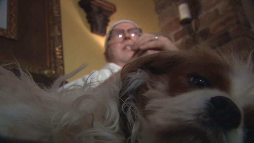 Mike Olsen (double lung transplant recipient) with dog