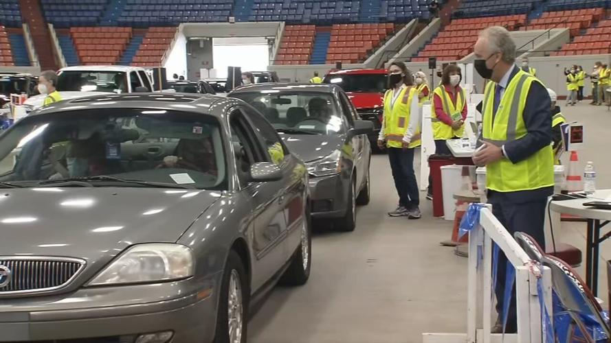 Drive-thru COVID-19 vaccination clinic at Broadbent Arena