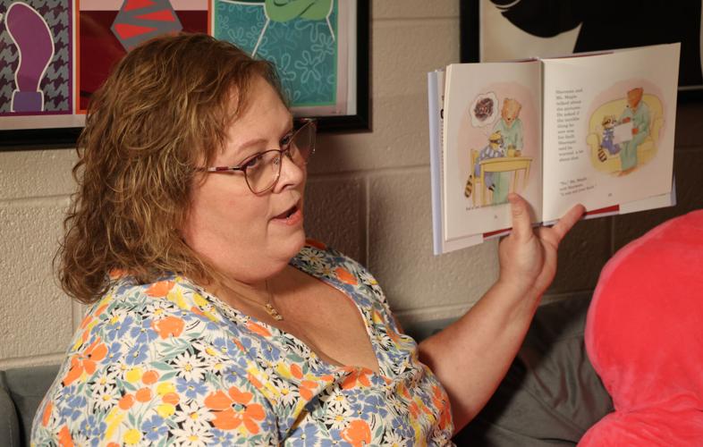 Lisa Overstreet reads a children's book