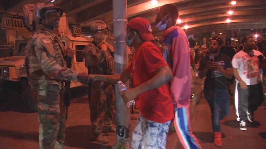 shaking hands protest 6-2-20.jpg