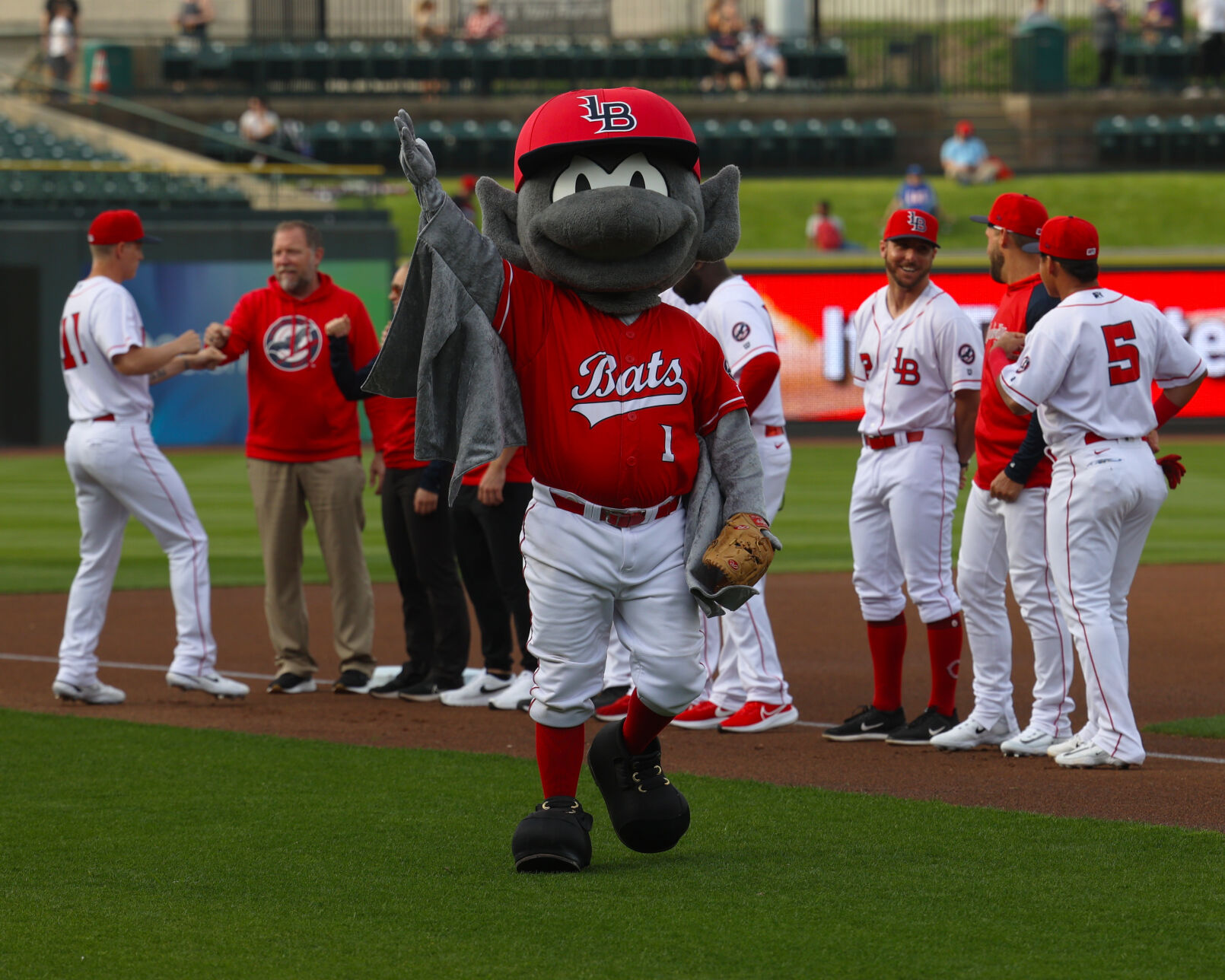 Buddy Bat waves to the crowd.JPG