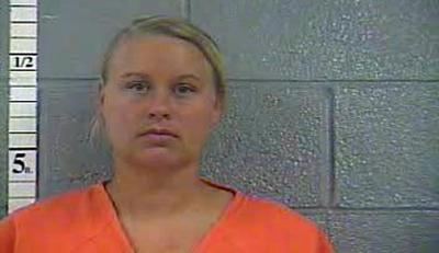 Shepherdsville woman arrested for leaving 2 children in her car while getting a tan