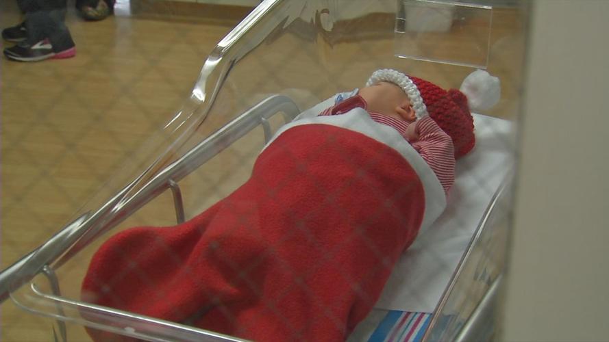 CHRISTMAS BABIES IN STOCKINGS BAPTIST HEALTH 2018 (1).jpg
