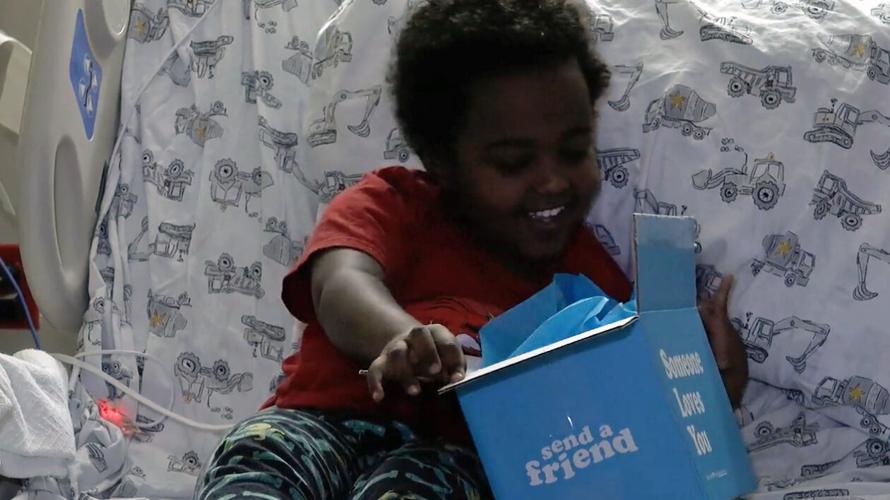 A Norton Healthcare child patient receives a Valentine's Day gift in 2022