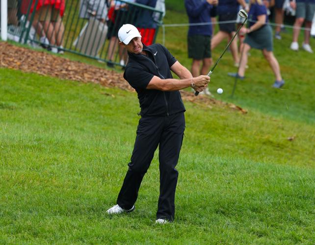 Rory McIlroy hits on practice range.JPG