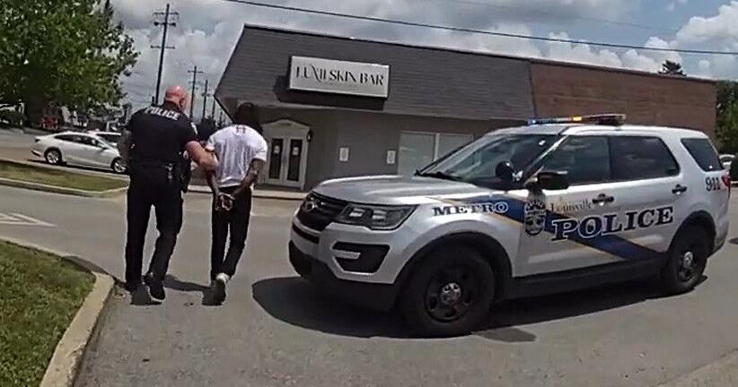 Louisville man who ran red light on e-bike, crashed into SUV sues LMPD for his arrest