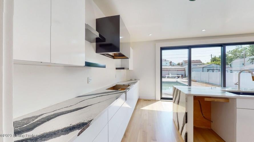 A fancy home in Louisville's Germantown neighborhood is listed at $750,000 as of June 15, 2023