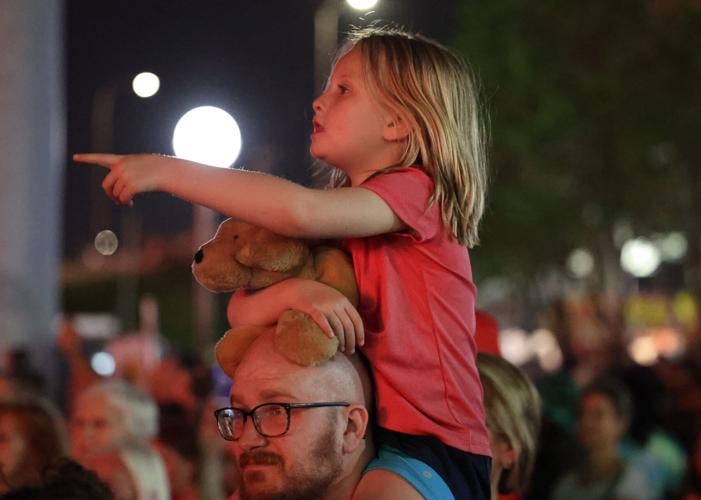Girl watches fireworks at Thunder Over Louisville