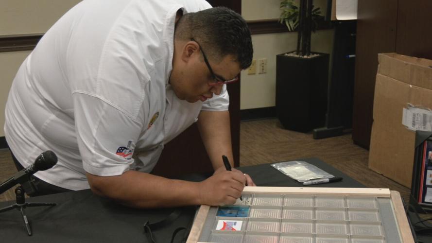 Chefs from the Sullivan University's culinary school signed a NASA locker that will be flown to the International Space Station