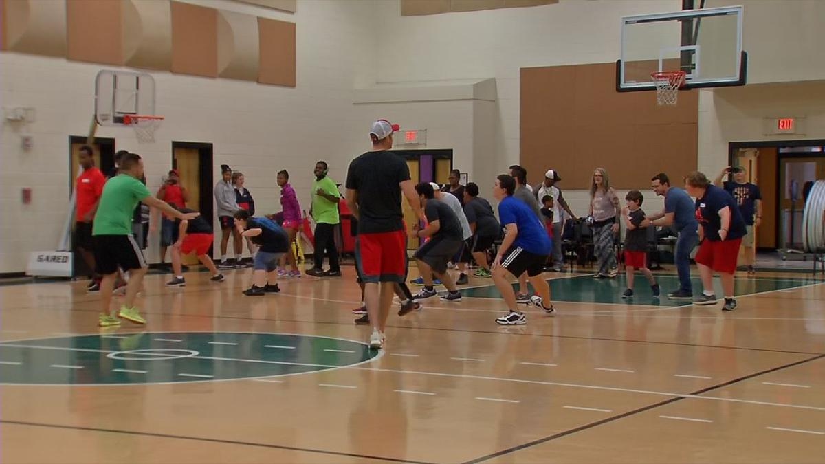 Former Card Luke Hancock Hosts Basketball Clinic For Children With