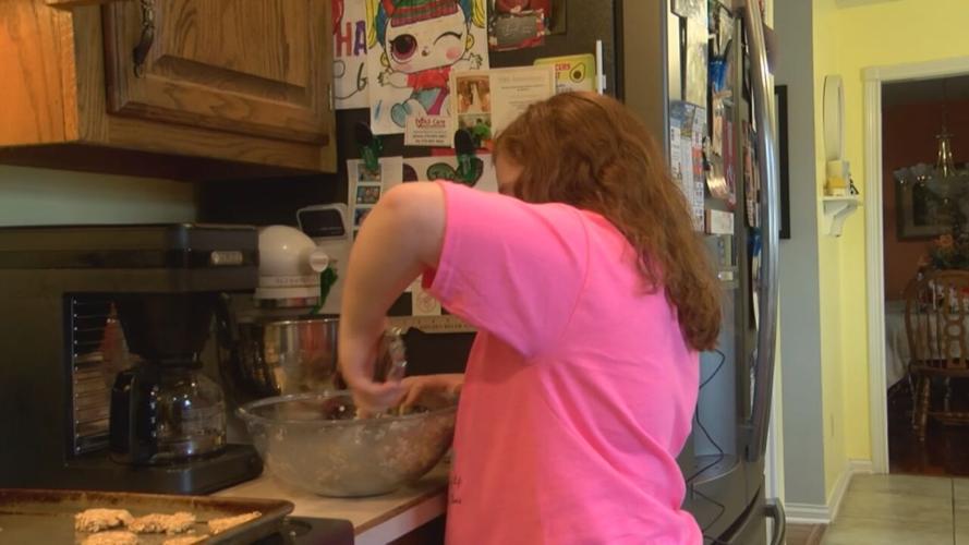 Raelyn Duncan baking dog treats.jpeg