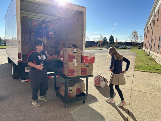 Students from Christian Academy of Indiana and Louisville loaded up a box truck with supplies