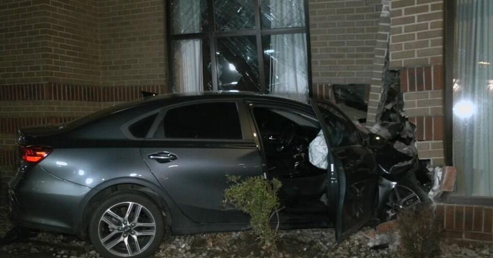 Stolen vehicle crashes into hotel across from KFC Yum! Center early Thursday morning