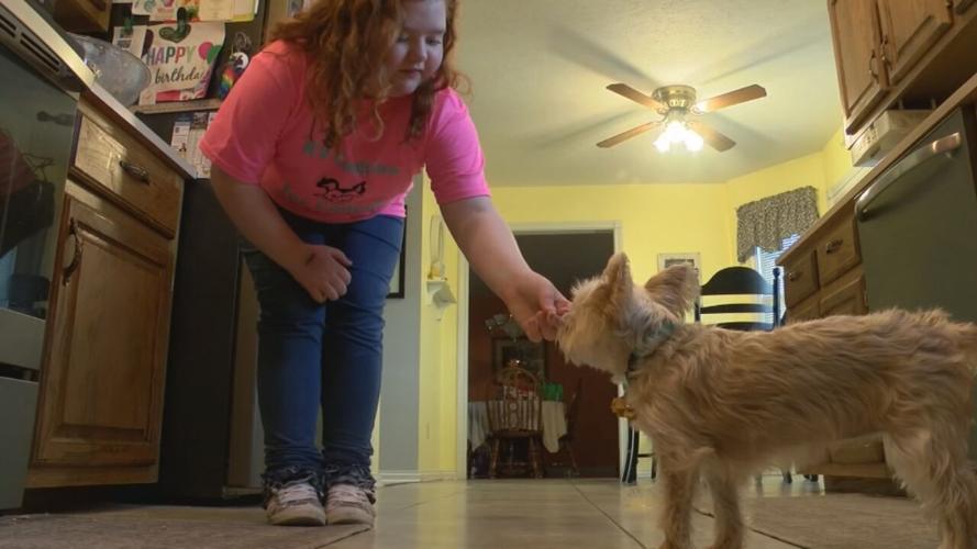 Raelyn Duncan baking dog treats.jpeg