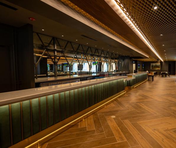 Long bar at Woodford Reserve Paddock Club.jpeg