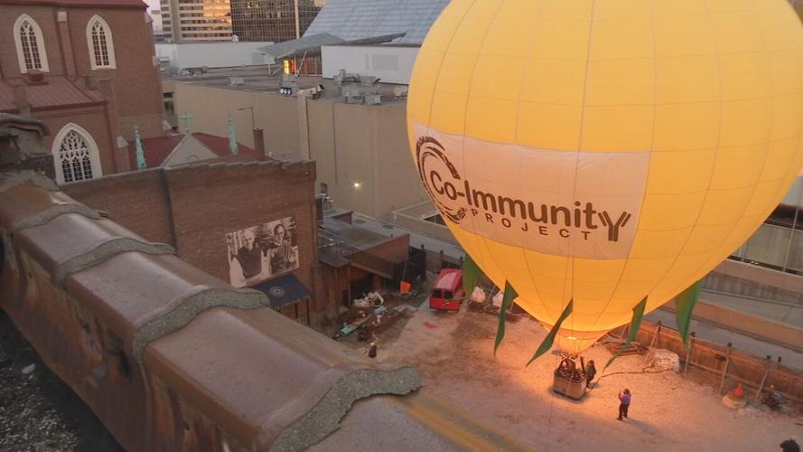 Downtown balloon glow for COVID victims 3.jpeg