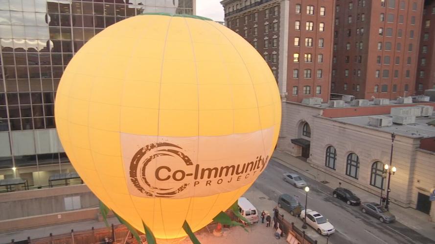 Downtown balloon glow for COVID victims 2.jpeg