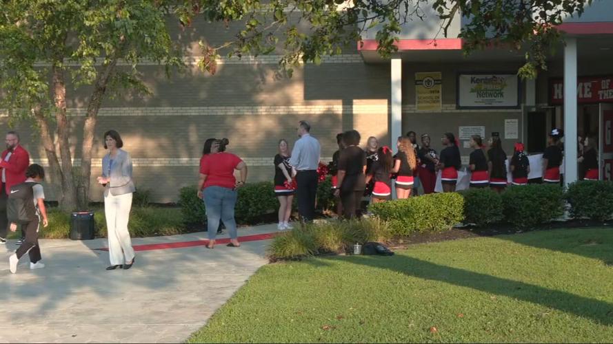 Bluegrass Middle School students line up outside building on first day of school