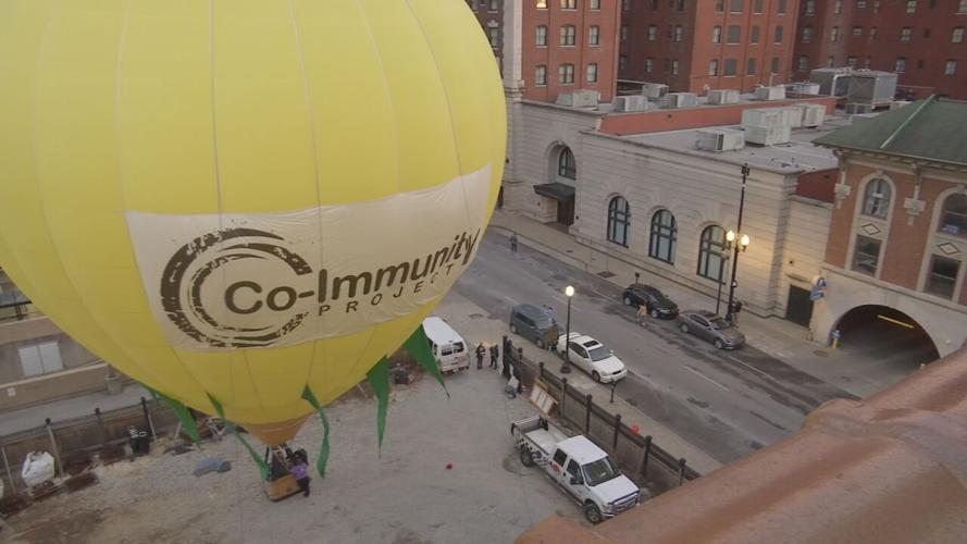 Downtown balloon glow for COVID victims.jpeg