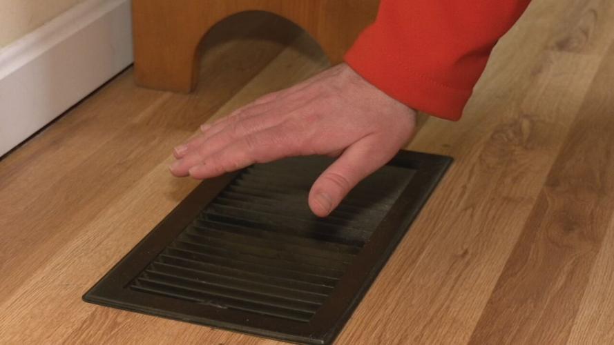Heat vent in floor of home.jpeg