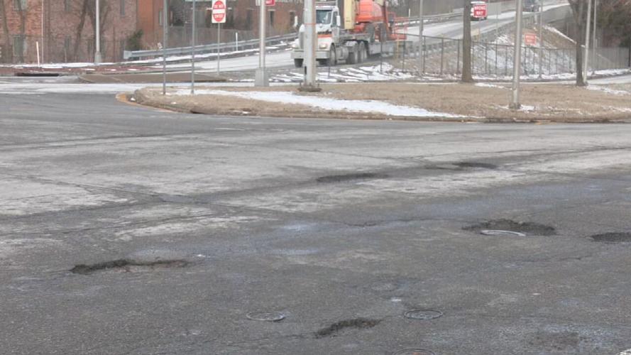 Potholes near interstate ramp in downtown Louisville, Kentucky