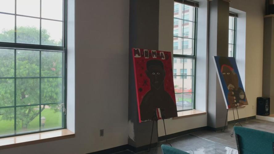 Roots 101 student art exhibit-West Louisville leaders 3.jpeg