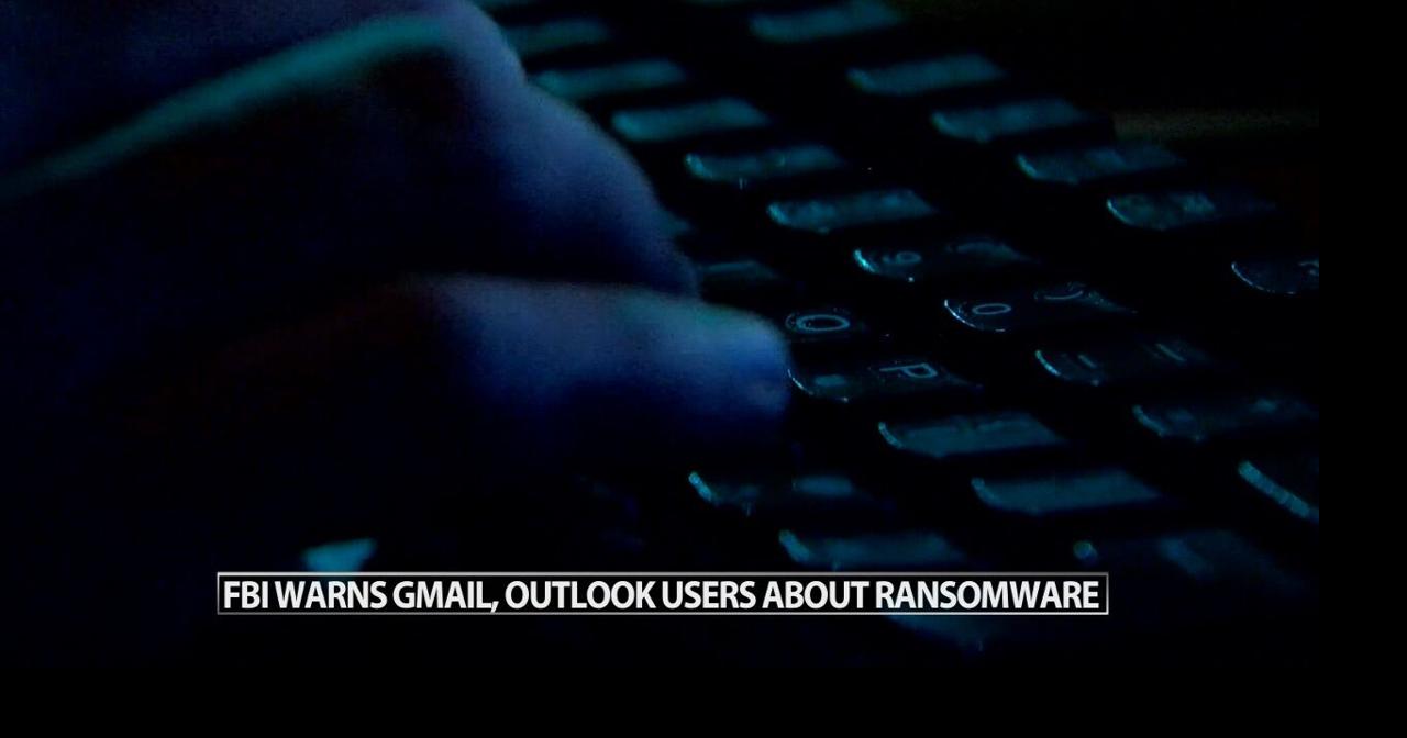 Computer screen with FBI warning blocking access to Outlook tasks and Gmail spam folder prominently.