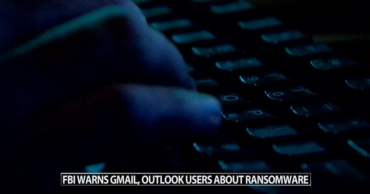 Computer screen with FBI warning blocking access to Outlook tasks and Gmail spam folder prominently.