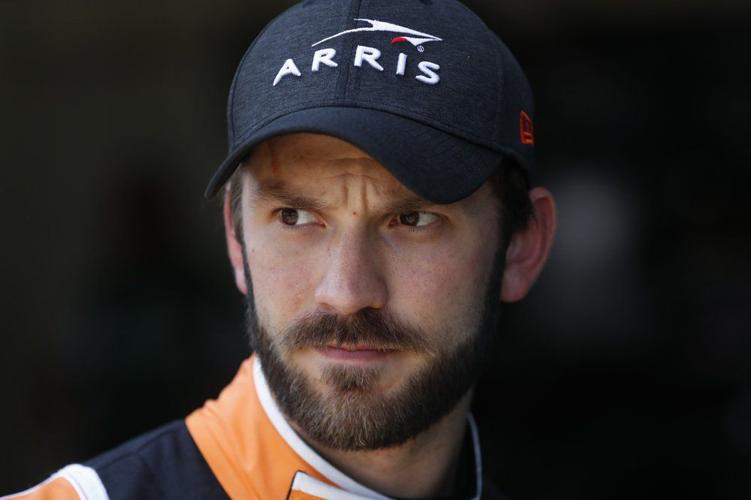 Daniel Suarez watches during practice
