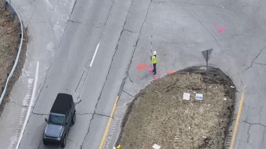 Road crews direct traffic on US 150 near Old Vincennes Road in Floyd County