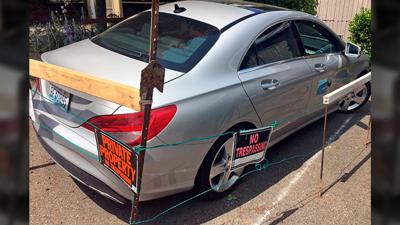 Seattle Man Builds Fence Around Car via KOMO